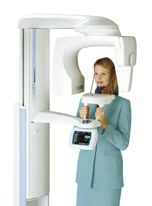 A woman using a CT scanner